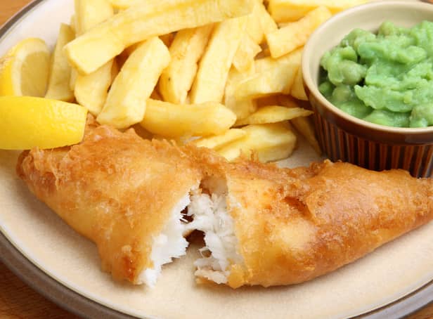 <p>Fried cod fillet with chips and mushy peas. Image: Joe Gough - stock.adobe.com.</p>