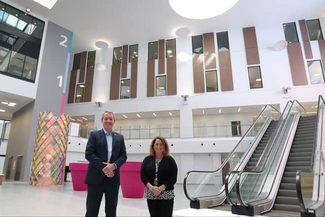 LUHFT CEO James Sumner and Chair Sue Musson in the atrium of the new hospital. Photo: LUHFT