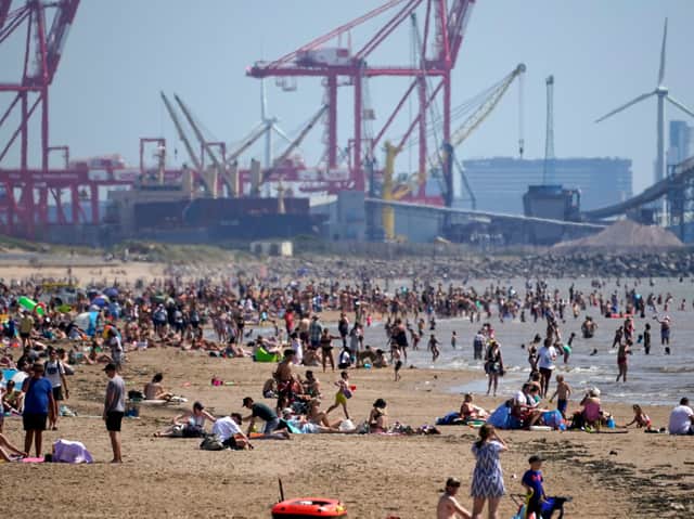 Crosby Beach with the dock and Liverpool in the background. Photo: Christopher Furlong/Getty Images