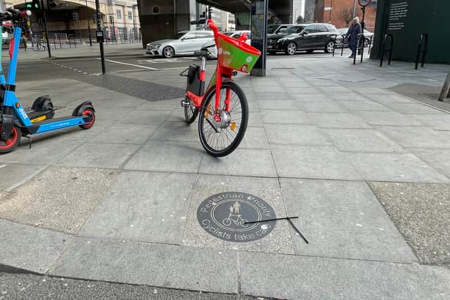 An e-bike badly parked in the middle of the pavement. Image: NFBUK