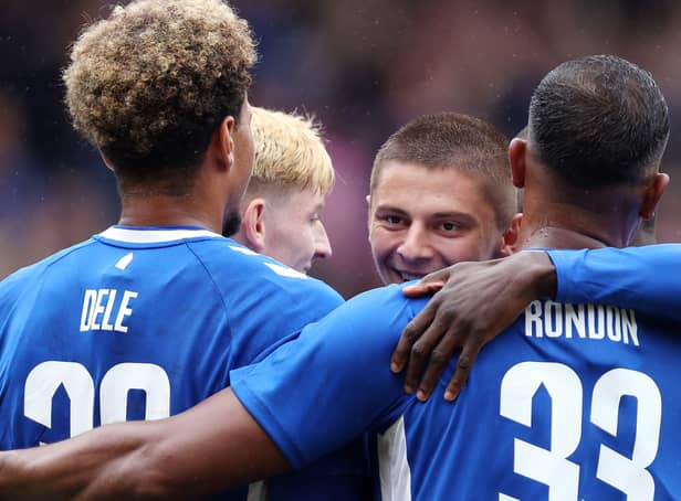 <p>Vitaliy Mykolenko of Everton celebrates with teammates after scoring their side's first goal during the Pre-Season Friendly match between Blackpool and Everton at Bloomfield Road on July 24, 2022 in Blackpool, England. (Photo by George Wood/Getty Images)</p>