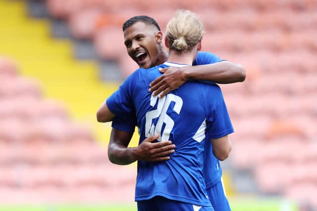 Tom Davies of Everton celebrates with Salomon Rondon after scoring Everton’s second goal. Picture:  George Wood/Getty Images