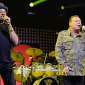 Musicians Astro and Ali Campbell of UB40 perform on stage. Image: Tim Mosenfelder/Getty Images for iHeartMedia