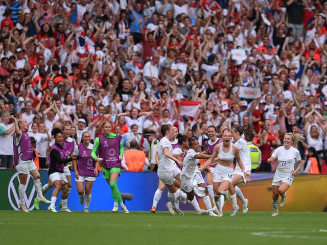 Chloe Kelly of England celebrates with team mates after scoring the winning goal during the UEFA Women's Euro 2022 final