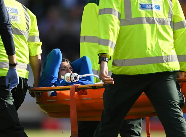 <p>LIVERPOOL, ENGLAND - AUGUST 06: Ben Godfrey of Everton is stretchered off the pitch after receiving medical treatment during the Premier League match between Everton FC and Chelsea FC at Goodison Park on August 06, 2022 in Liverpool, England. (Photo by Michael Regan/Getty Images)</p>