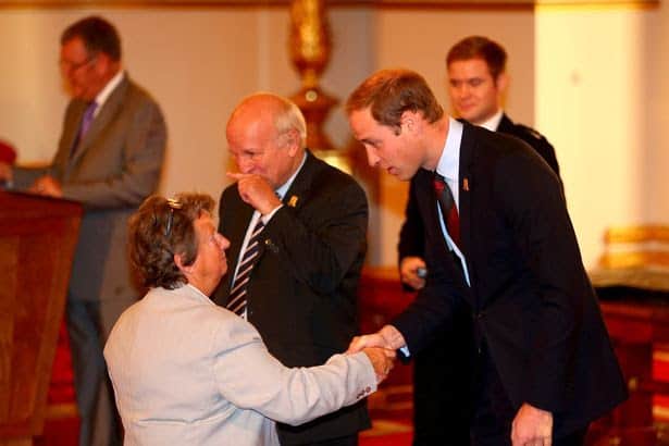 Prince William, Duke of Cambridge, in his role as president of The Football Association and FA chairman Greg Dyke hands a medal to Sylvia Gore as part of awarding medals to 150 grassroots heroes for their outstanding contribution and service to football.