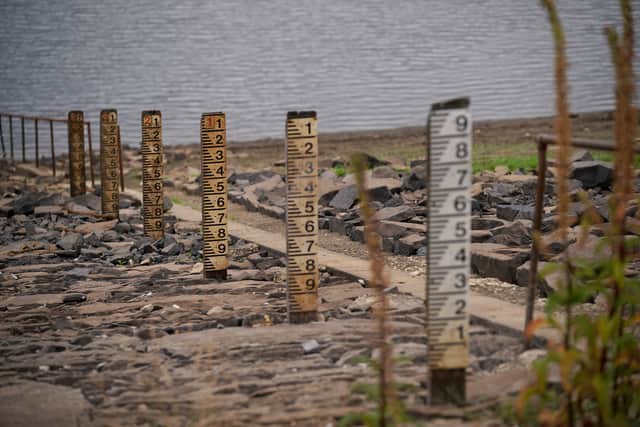  Depth markers show the water depletion of Yarrow reservoir near Bolton as the heatwave continues across the UK. Yet United Utilities have yet to issue any hose pipe bans.