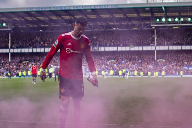 Cristiano Ronaldo walks off at the end of the Premier League match against Everton. Image: Ash Donelon/Manchester United via Getty Images