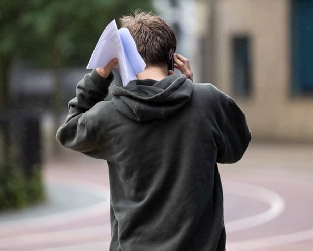 A nervous student awaits their GCSE result.