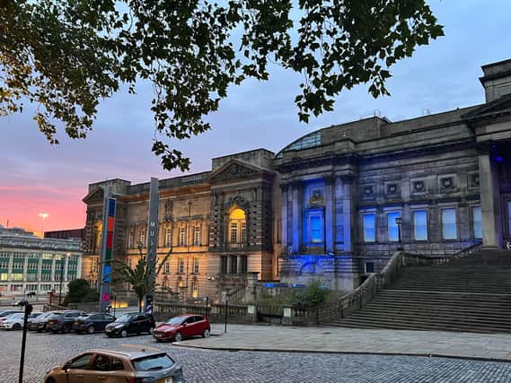 Liverpool Museum Hall lights up yellow and blue. Image: Emma Dukes/LiverpoolWorld