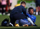 Mason Holgate receives treatment. Picture: Marc Atkins/Getty Images