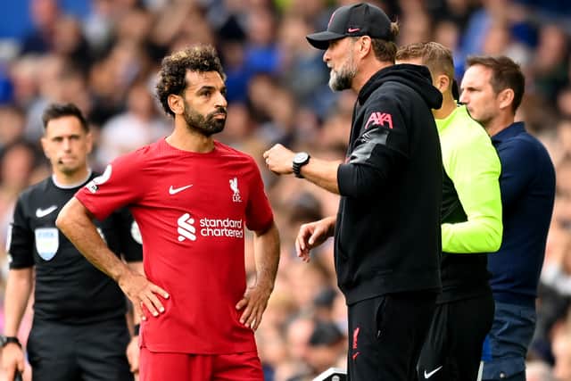  Jurgen Klopp speaks to Mohamed Salah of Liverpool during the Premier League match between Everton FC and Liverpool FC at Goodison Park on September 03, 2022 in Liverpool, England. (Photo by Michael Regan/Getty Images)