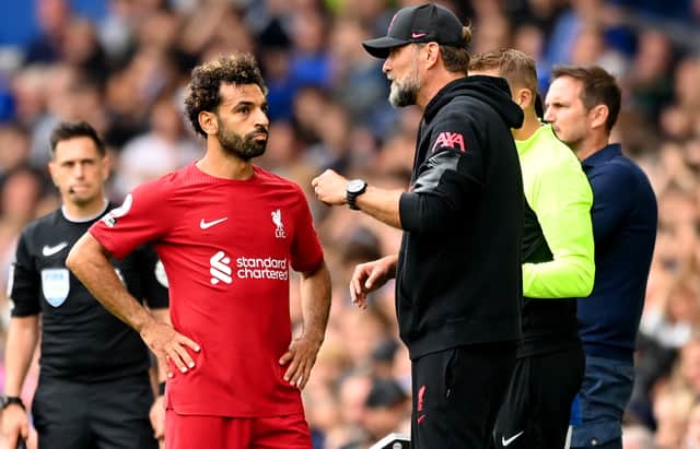  Jurgen Klopp speaks to Mohamed Salah of Liverpool during the Premier League match between Everton FC and Liverpool FC at Goodison Park on September 03, 2022 in Liverpool, England. (Photo by Michael Regan/Getty Images)