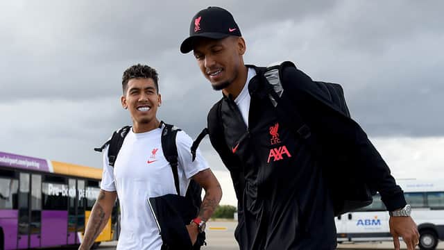 Fabinho and Roberto Firmino of Liverpool departing ahead of their UEFA Champions League group A match against SSC Napoli at Liverpool John Lennon Airport on September 06, 2022 in Liverpool, England. (Photo by Andrew Powell/Liverpool FC via Getty Images)