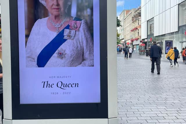 A billboard commemorating the Queen in Liverpool city centre.