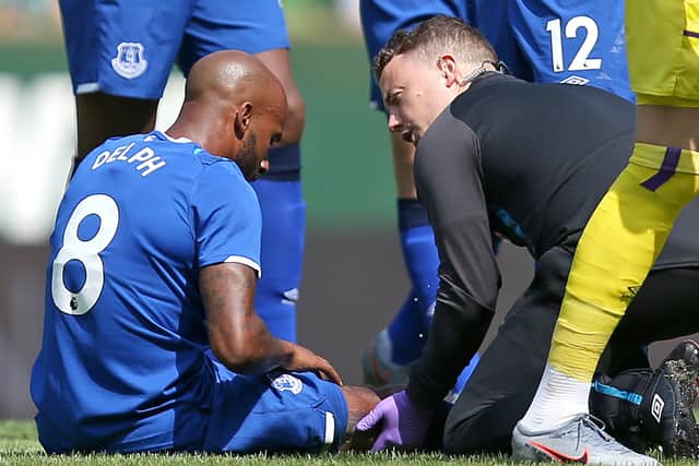 Fabian Delph receives treatment. Picture: Cathrin Mueller/Getty Images