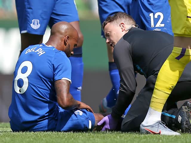 Fabian Delph receives treatment. Picture: Cathrin Mueller/Getty Images