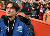 Brentford boss Thomas Frank walks ahead of Liverpool manager Jurgen Klopp at Anfield. Picture: Andrew Powell/Liverpool FC via Getty Images