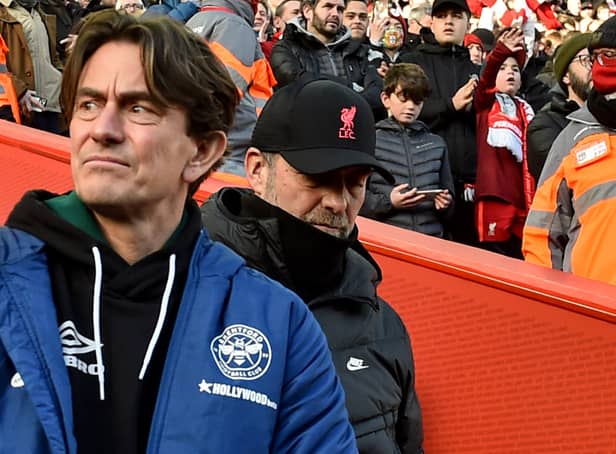 <p>Brentford boss Thomas Frank walks ahead of Liverpool manager Jurgen Klopp at Anfield. Picture: Andrew Powell/Liverpool FC via Getty Images</p>