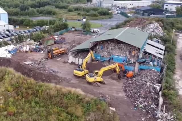 Waste being cleared on a site in Bromborough. Credit: Air Real Media.