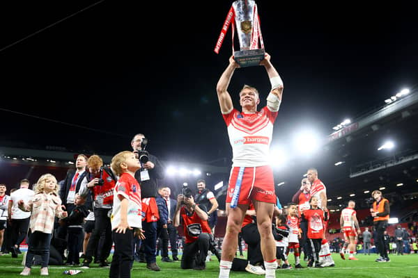 Jonny Lomax of St Helens lifts the Betfred Super League Grand Final Trophy. (Photo by Michael Steele/Getty Images)