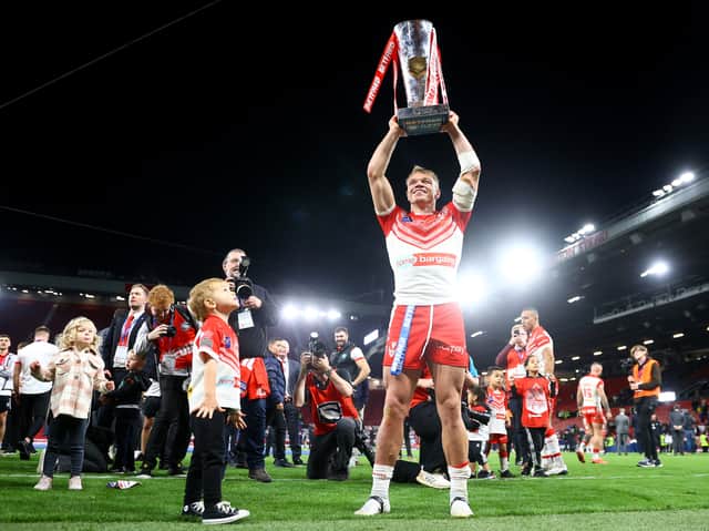 <p>Jonny Lomax of St Helens lifts the Betfred Super League Grand Final Trophy. (Photo by Michael Steele/Getty Images)</p>