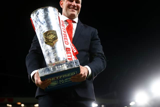 St Helens head coach Kristian Woolf holds the Betfred Super League Grand Final Trophy. Image: Michael Steele/Getty Images