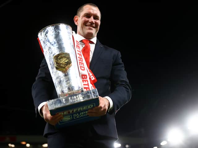 <p>St Helens head coach Kristian Woolf holds the Betfred Super League Grand Final Trophy. Image: Michael Steele/Getty Images</p>