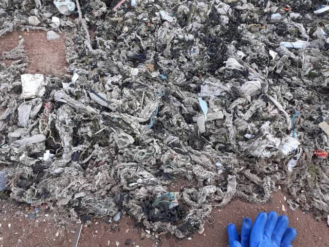A community group in Rock Ferry said they had found thousands of wet wipes they think come from sewage. Credit: Adrian Keeler. 