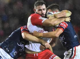 Alex Walmsley of St Helens on the charge against Sydney Roosters during the World Club Challenge in 2020. Image: Nathan Stirk/Getty Images