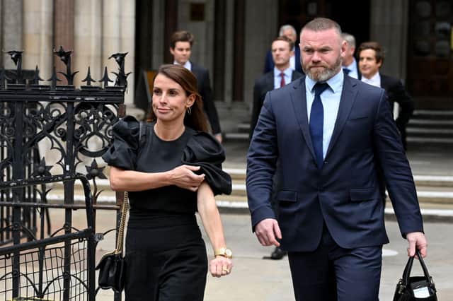 Coleen Rooney with husband Wayne Rooney outside Royal Courts of Justice, Strand on May 12, 2022. Credit: Getty Images