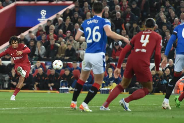 Trent Alexander-Arnold scores the first goal during the UEFA Champions League group A match between Liverpool and Rangers at Anfield