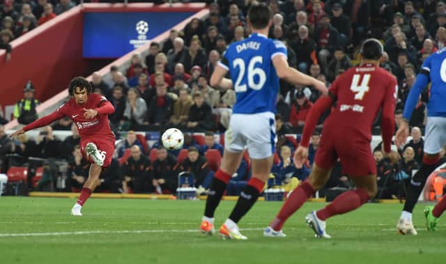Trent Alexander-Arnold scores the first goal during the UEFA Champions League group A match between Liverpool and Rangers at Anfield