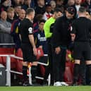 Referee Michael Oliver speaks to Jurgen Klopp, Manager of Liverpool and  Mikel Arteta, Manager of Arsenal after an on field incident during the Premier League match between Arsenal FC and Liverpool FC