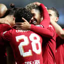  Darwin Nunez of Liverpool celebrates with teammates after scoring their team's third goal during the UEFA Champions League group A match between Rangers FC and Liverpool FC at Ibrox Stadium on October 12, 2022 in Glasgow, Scotland. (Photo by Ian MacNicol/Getty Images)