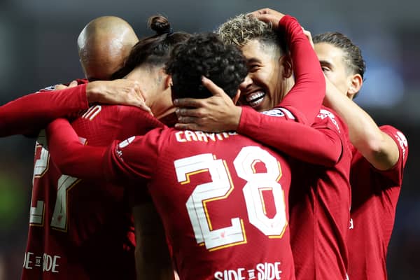  Darwin Nunez of Liverpool celebrates with teammates after scoring their team's third goal during the UEFA Champions League group A match between Rangers FC and Liverpool FC at Ibrox Stadium on October 12, 2022 in Glasgow, Scotland. (Photo by Ian MacNicol/Getty Images)