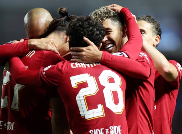 <p> Darwin Nunez of Liverpool celebrates with teammates after scoring their team's third goal during the UEFA Champions League group A match between Rangers FC and Liverpool FC at Ibrox Stadium on October 12, 2022 in Glasgow, Scotland. (Photo by Ian MacNicol/Getty Images)</p>
