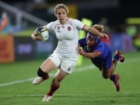 Abby Dow of England is tackled during the Pool C Rugby World Cup 2021 match between France and England 