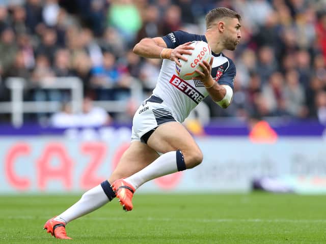 <p>St Helens winger Tommy Makinson in action for England at the Rugby League World Cup. Image:  Alex Livesey/Getty Images for RLWC</p>