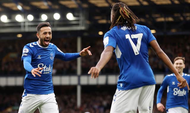 Dwight McNeil of Everton celebrates after scoring their team's third goal during the Premier League match between Everton FC and Crystal Palace at Goodison Park on October 22, 2022 in Liverpool, England. (Photo by Naomi Baker/Getty Images)