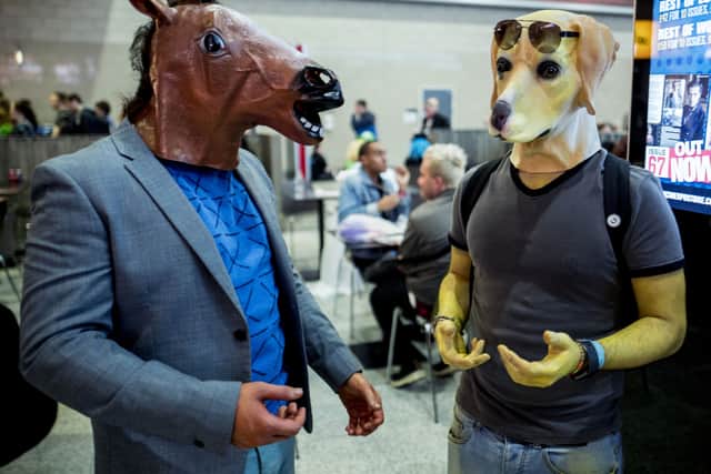 A pair dress up as Bojack Horseman characters. Image: Tolga Akmen/AFP/Getty