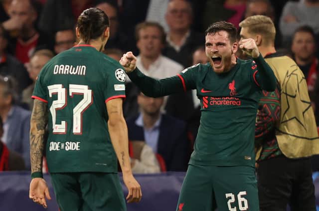 Darwin Nunez celebrates with Andy Robertson of Liverpool after scoring their team's second goal during the UEFA Champions League group A match between AFC Ajax and Liverpool FC at Johan Cruyff Arena on October 26, 2022 in Amsterdam, Netherlands. (Photo by Dean Mouhtaropoulos/Getty Images)