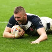 Joe Batchelor of England goes over for his side’s thirteenth try against Greece at the Rugby League World Cup.