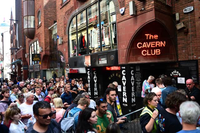 Fans of Paul McCartney make their way inside The Cavern Club, as the singer plays a one off gig at the legendary venue on July 26, 2018 in Liverpool, England. (Photo by Richard Martin-Roberts/Getty Images)