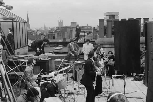 British rock group the Beatles performing their last live public concert on the rooftop of the Apple Organization building on 30th January 1969. (Photo by Evening Standard/Hulton Archive/Getty Images)