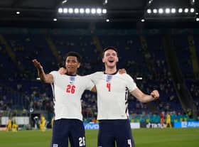 Jude Bellingham and Declan Rice of England celebrate after victory in the UEFA Euro 2020 Championship Quarter-final against Ukraine (Photo by Alessandra Tarantino - Pool/Getty Images)