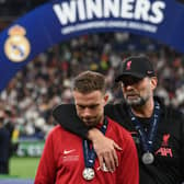 Liverpool manager Jurgen Klopp with captain Jordan Henderson after the 2022 Champions League final loss to Real Madrid. Picture: FRANCK FIFE/AFP via Getty Images