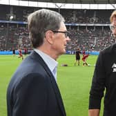 Liverpool manager Jurgen Klopp speaks with principal owner John W. Henry. Picture: John Powell/Liverpool FC via Getty Images