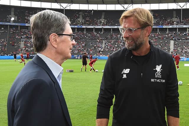 Liverpool manager Jurgen Klopp speaks with principal owner John W. Henry. Picture: John Powell/Liverpool FC via Getty Images