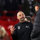 Derby manager Paul Warne speaks to Liverpool boss Jurgen Klopp. Picture: Nathan Stirk/Getty Images
